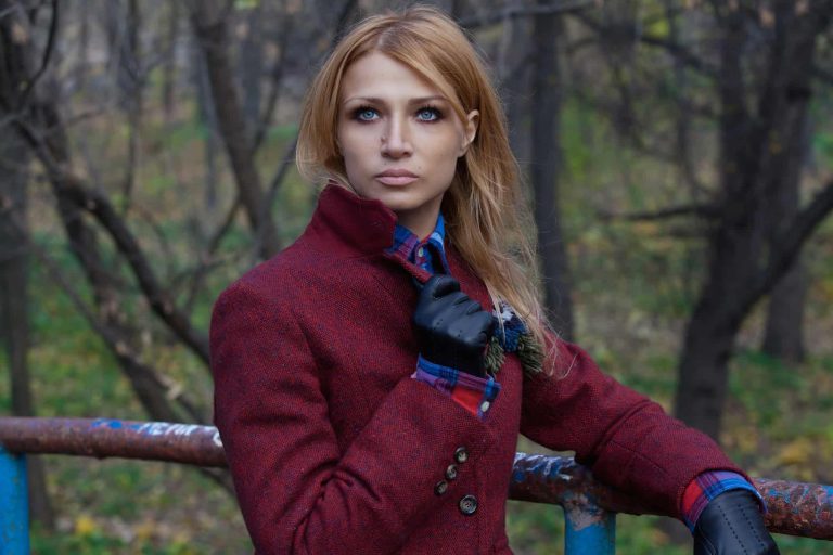 Woman in red tweed jacket