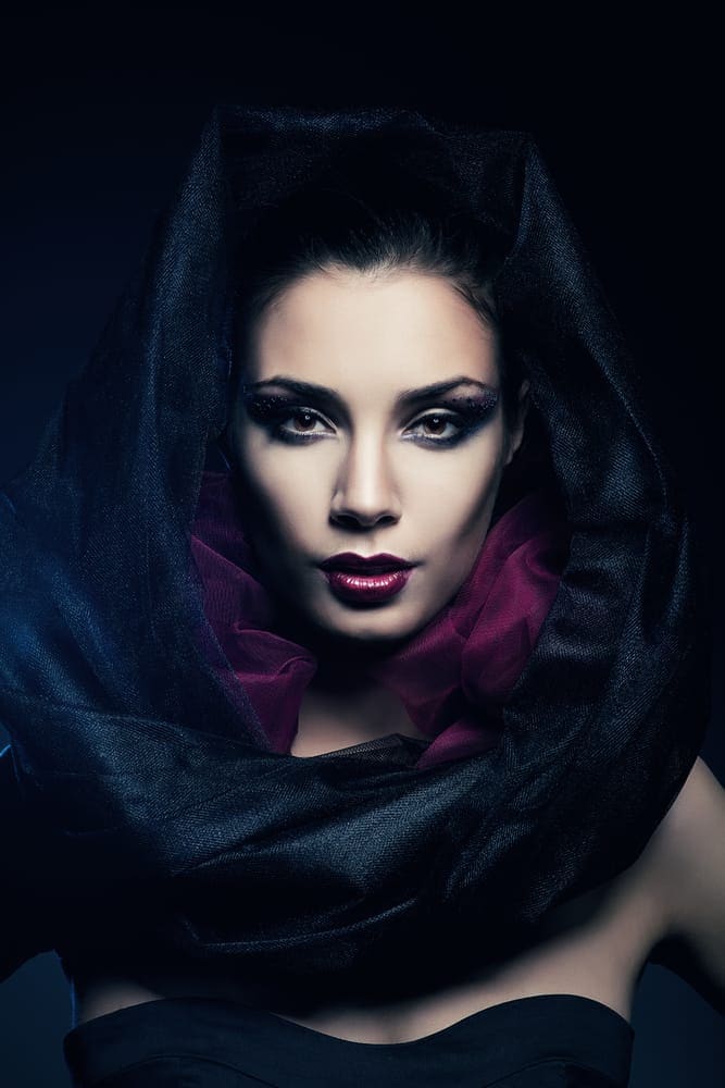 woman in black hood